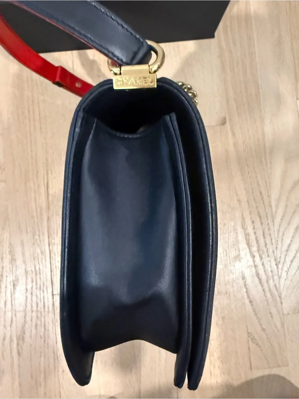 Authentic Chanel Navy Quilted Medium Boy Bag with Red & Gold Accent
